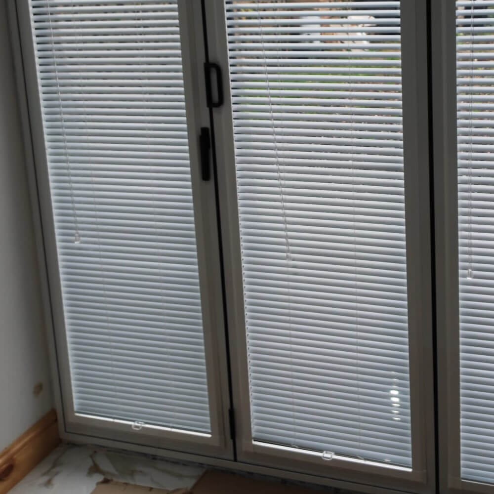 Amris Blinds fitted in a bright living space
